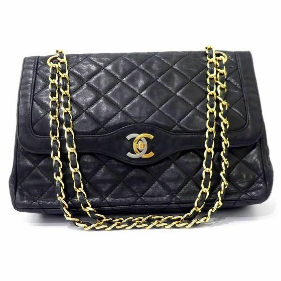 Large classic handbag, Grained calfskin & gold-tone metal, black — Fashion