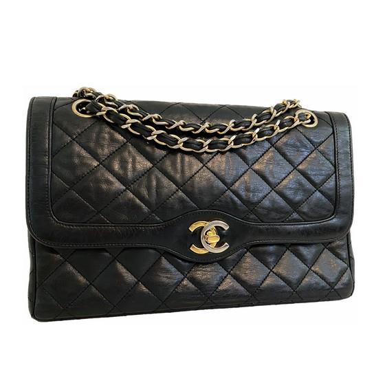 Vintage and Musthaves. Chanel black medium double flap bag Paris