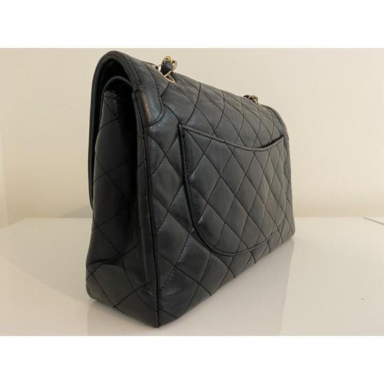 Vintage and Musthaves. Chanel black medium double flap bag Paris